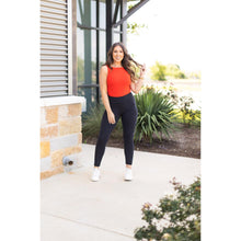 Load image into Gallery viewer, High-waisted black ankle length leggings with pockets by Julia Rose, Julia Rose women’s black 7/8 leggings lifestyle image