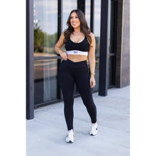 Load image into Gallery viewer, Julia Rose Stephanie crossover black pocket leggings, Women wearing black crossover leggings