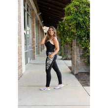 Load image into Gallery viewer, Women’s black leggings with zebra print panels Stretchy leggings withflattering fit"