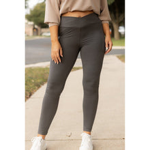 Load image into Gallery viewer, High-waisted charcoal crossover leggings with pockets by Julia Rose, Julia Rose women’s charcoal full length leggings lifestyle image