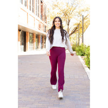 Load image into Gallery viewer, High-waisted maroon bootcut leggings with pockets by Julia Rose, Julia Rose women’s maroon flared leggings lifestyle image
