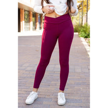 Load image into Gallery viewer, High-waisted maroon crossover leggings with pockets by Julia Rose, Julia Rose women’s maroon full length leggings lifestyle image