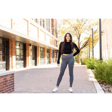 Load image into Gallery viewer, High-waisted charcoal crossover leggings with pockets by Julia Rose, Julia Rose women’s charcoal full length leggings lifestyle image