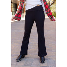 Load image into Gallery viewer, High-waisted black bootcut leggings by Julia Rose, Julia Rose women’s flared black leggings lifestyle image