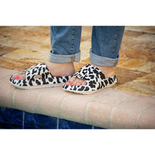 Load image into Gallery viewer, White leopard-print beach slides with a bold spotted pattern and easy slip-on design