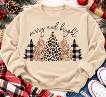 Load image into Gallery viewer, Merry and Bright Christmas graphic apparel featuring leopard print, buffalo plaid and glitter-inspired gold Christmas trees, available in three colors and four styles including crewneck tee, V-neck tee, sweatshirt and hoodie.