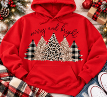 Load image into Gallery viewer, Merry and Bright Christmas graphic apparel featuring leopard print, buffalo plaid and glitter-inspired gold Christmas trees, available in three colors and four styles including crewneck tee, V-neck tee, sweatshirt and hoodie.