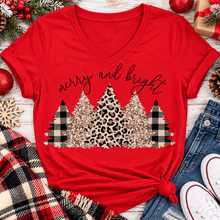 Load image into Gallery viewer, Merry and Bright Christmas graphic apparel featuring leopard print, buffalo plaid and glitter-inspired gold Christmas trees, available in three colors and four styles including crewneck tee, V-neck tee, sweatshirt and hoodie.