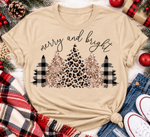 Load image into Gallery viewer, Merry and Bright Christmas graphic apparel featuring leopard print, buffalo plaid and glitter-inspired gold Christmas trees, available in three colors and four styles including crewneck tee, V-neck tee, sweatshirt and hoodie.