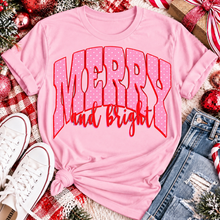 Load image into Gallery viewer, Merry and Bright Christmas graphic apparel with oversized pink polka dot lettering and festive holiday design