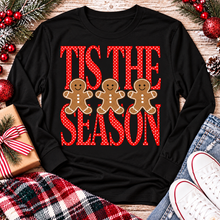 Load image into Gallery viewer, Tis the Season Christmas graphic apparel featuring red polka dot lettering and three gingerbread cookies