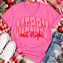 Load image into Gallery viewer, Merry and Bright Christmas graphic apparel with oversized pink polka dot lettering and festive holiday design
