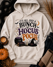 Load image into Gallery viewer, Hocus Pocus Halloween graphic hoodie featuring witch hat, cauldron, bats and spell books
