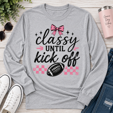 Load image into Gallery viewer, Classy Until Kick Off graphic long sleeve crewneck tee with pink bow and football design
