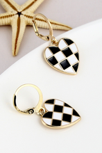 Load image into Gallery viewer, Heart-shaped earrings with black and white checkered design on a light background
