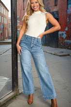 Load image into Gallery viewer, Flirty and on trend stone washed jeans.
