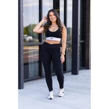 Load image into Gallery viewer, Julia Rose Stephanie crossover black pocket leggings, Women wearing black crossover leggings
