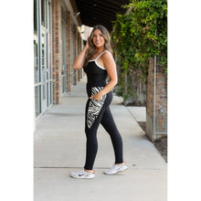 Load image into Gallery viewer, Women’s black leggings with zebra print panels  Stretchy leggings withflattering fit"
