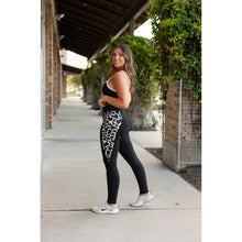 Load image into Gallery viewer, Julia Rose Carolina Cow Print Panel Leggings women’s boutique leggings front view, Woman wearing Julia Rose Carolina leggings with cow print panel detail
