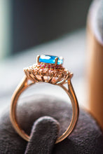 Load image into Gallery viewer, Navy Sapphire Blue Halo Rose Gold Ring
