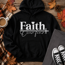 Load image into Gallery viewer, Julia Rose Faith Over Fear apparel featuring a white heart and cross design, available as a crewneck, V-neck, long-sleeve T-shirt and hoodie.
