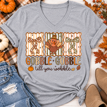 Load image into Gallery viewer, Gobble Gobble Till You Wobble Thanksgiving graphic apparel featuring a cute turkey, polka dot bows, retro fall colors, pumpkins and autumn leaves.
