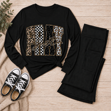 Load image into Gallery viewer, Julia Rose JUST PRAY apparel featuring leopard print, checkerboard and dotted lettering with gold-toned details.
