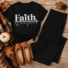 Load image into Gallery viewer, Julia Rose Faith Over Fear apparel featuring a white heart and cross design, available as a crewneck, V-neck, long-sleeve T-shirt and hoodie.
