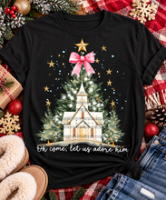 Load image into Gallery viewer, Oh Come Let Us Adore Him Christian Christmas graphic apparel with church, Christmas trees, stars and pink bow
