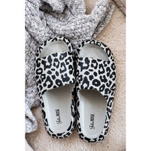 Load image into Gallery viewer, Gray leopard-print beach slides with a bold spotted pattern and easy slip-on design.

