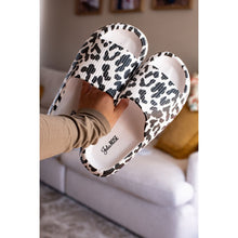 Load image into Gallery viewer, White leopard-print beach slides with a bold spotted pattern and easy slip-on design

