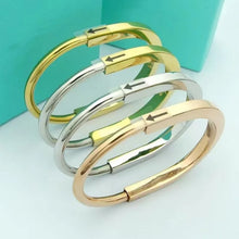 Load image into Gallery viewer, Dane Oval Buckle Bangle
