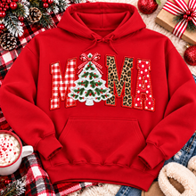 Load image into Gallery viewer, Festive MAMA Christmas graphic apparel featuring bold red gingham, leopard print and red polka dot lettering with a decorated Christmas tree and gingham bow replacing the first A, available in black and red in short sleeve crewneck, V-neck, long sleeve crewneck sweatshirt and hoodie styles.

