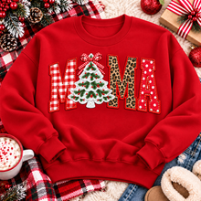 Load image into Gallery viewer, Festive MAMA Christmas graphic apparel featuring bold red gingham, leopard print and red polka dot lettering with a decorated Christmas tree and gingham bow replacing the first A, available in black and red in short sleeve crewneck, V-neck, long sleeve crewneck sweatshirt and hoodie styles.
