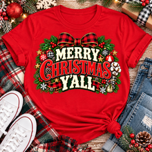 Load image into Gallery viewer, Merry Christmas Y'all graphic apparel featuring vintage red, green, and cream lettering with a festive buffalo plaid bow, Christmas ornaments, pine greenery, and rustic holiday decorations. Southern Christmas graphic available in two colors and four styles, including short sleeve crewneck, V-neck, long sleeve, and hoodie.
