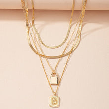 Load image into Gallery viewer, Gold Initial Letter and Lock Multi Layer Necklace in Gold Setting
