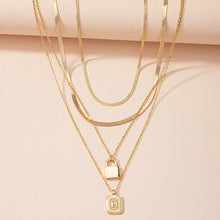 Load image into Gallery viewer, Gold Initial Letter and Lock Multi Layer Necklace in Gold Setting
