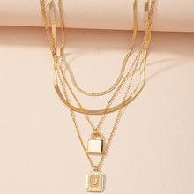 Load image into Gallery viewer, Gold Initial Letter and Lock Multi Layer Necklace in Gold Setting
