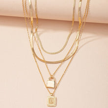 Load image into Gallery viewer, Gold Initial Letter and Lock Multi Layer Necklace in Gold Setting
