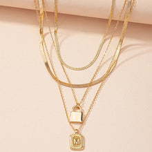 Load image into Gallery viewer, Gold Initial Letter and Lock Multi Layer Necklace in Gold Setting
