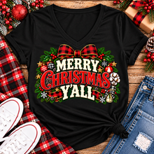 Load image into Gallery viewer, Merry Christmas Y'all graphic apparel featuring vintage red, green, and cream lettering with a festive buffalo plaid bow, Christmas ornaments, pine greenery, and rustic holiday decorations. Southern Christmas graphic available in two colors and four styles, including short sleeve crewneck, V-neck, long sleeve, and hoodie.

