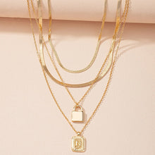 Load image into Gallery viewer, Gold Initial Letter and Lock Multi Layer Necklace in Gold Setting
