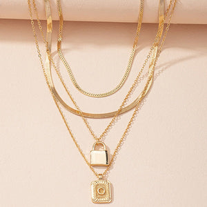 Gold Initial Letter and Lock Multi Layer Necklace in Gold Setting