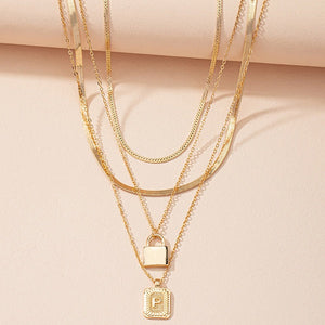 Gold Initial Letter and Lock Multi Layer Necklace in Gold Setting