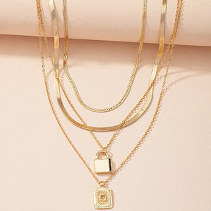 Gold Initial Letter and Lock Multi Layer Necklace in Gold Setting