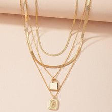 Load image into Gallery viewer, Gold Initial Letter and Lock Multi Layer Necklace in Gold Setting
