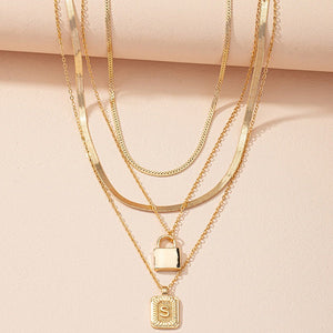 Gold Initial Letter and Lock Multi Layer Necklace in Gold Setting