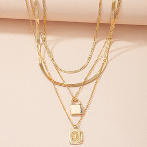 Gold Initial Letter and Lock Multi Layer Necklace in Gold Setting