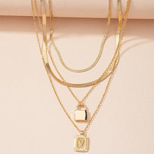 Load image into Gallery viewer, Gold Initial Letter and Lock Multi Layer Necklace in Gold Setting
