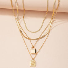 Load image into Gallery viewer, Gold Initial Letter and Lock Multi Layer Necklace in Gold Setting
